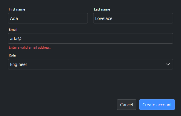 A two-column form with an email validation error — dark theme