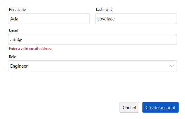 A two-column form with an email validation error — light theme