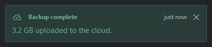 A persistent notification with a close button — dark theme